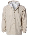 Front of a khaki nylon coach's jacket with gold buttons and a hood.