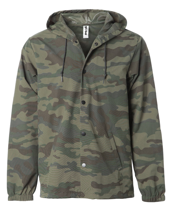 Front of a green camouflage nylon coach's jacket with black buttons and a hood.
