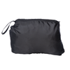 Close up of a puffer vest packed into a zipper pouch.