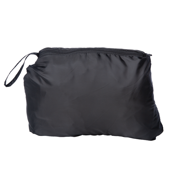 Close up of a puffer vest packed into a zipper pouch.