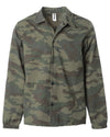 Front of a green camouflage nylon coach's jacket.